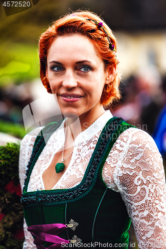 Image of Portrait of a young woman in dirndl