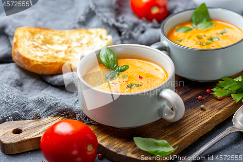 Image of Delicious tomato soup with spices and herbs.