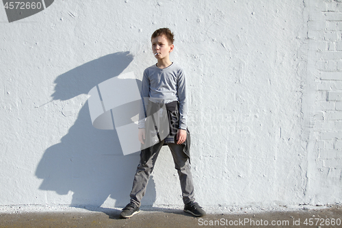 Image of Boy with blue lollipop