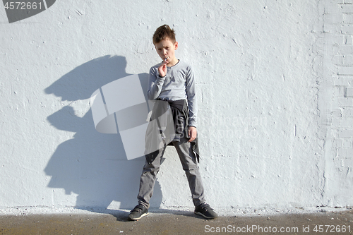 Image of Boy with blue lollipop