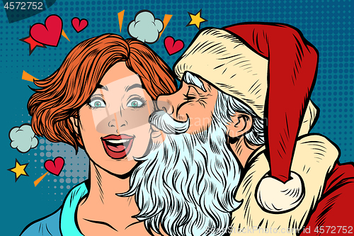 Image of Santa Claus kisses a woman, Christmas and New year