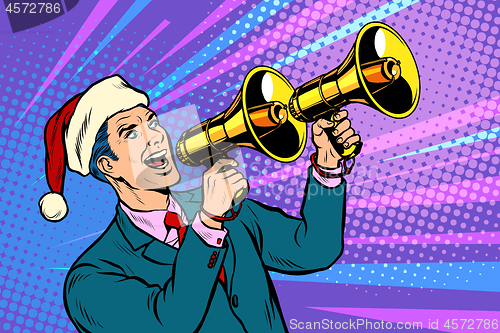 Image of Christmas sale. Businessman advertises with megaphone