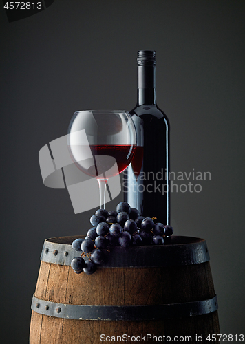 Image of bottle and glass of red wine