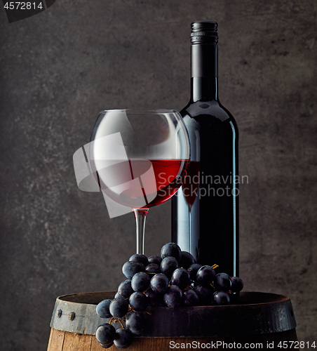 Image of bottle and glass of red wine