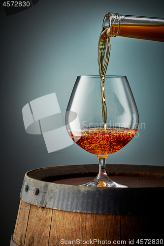 Image of cognac pouring into glass