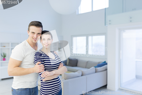 Image of couple hugging in their new home