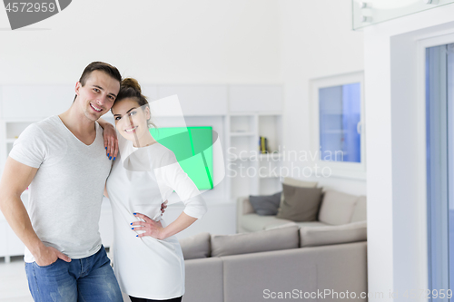 Image of couple hugging in their new home