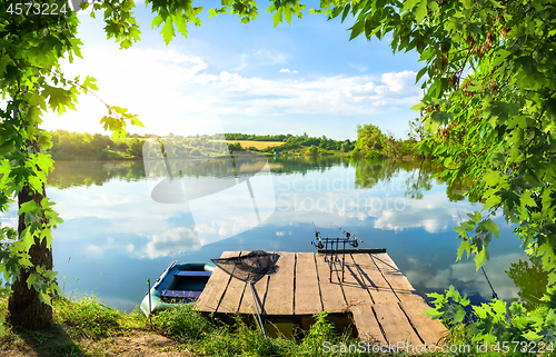 Image of Wooden pier and pond