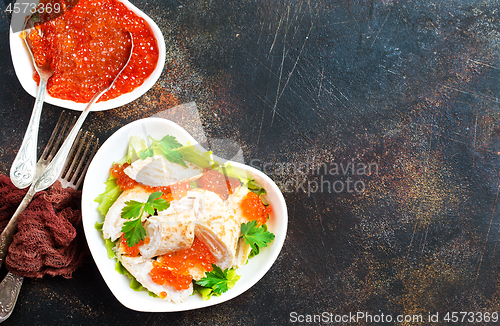 Image of pancakes with salmon caviar