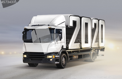 Image of truck delivers 2020 by new year in winter