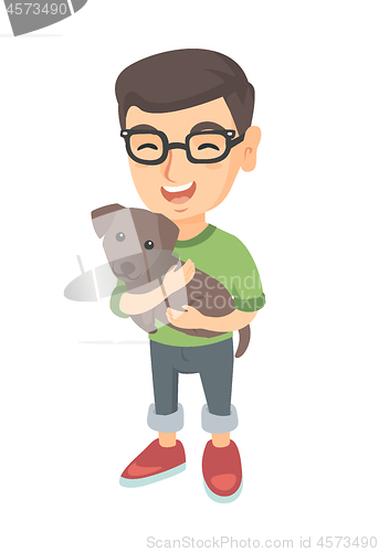 Image of Caucasian happy boy in glasses holding a dog.