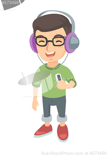 Image of Caucasian boy listening to music in headphones.