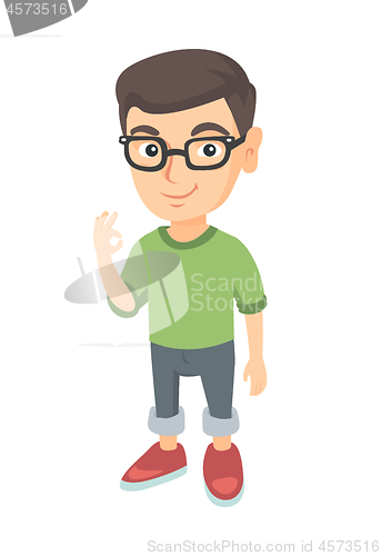 Image of Caucasian little boy showing ok sign.