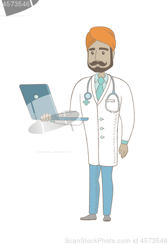 Image of Young indian doctor using a laptop.