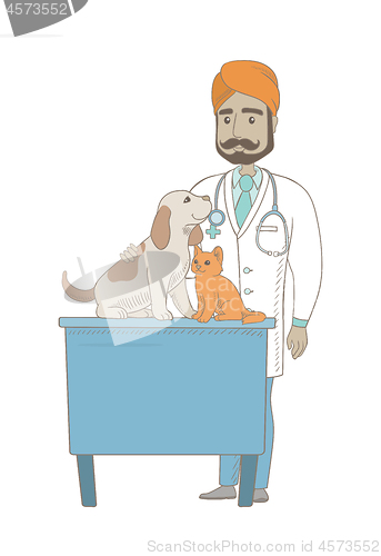 Image of Young indian veterinarian examining pets.