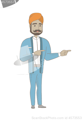 Image of Hindu businessman pointing to the side.