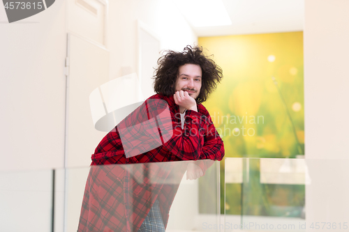 Image of portrait of young man in bathrobe