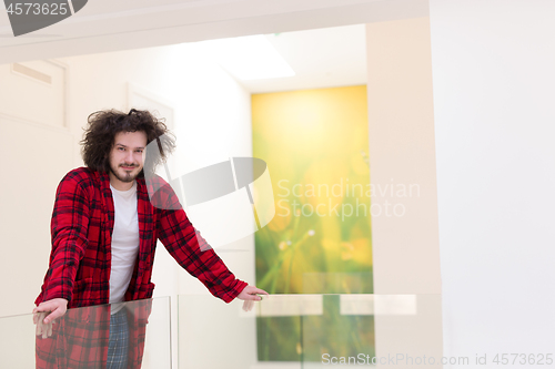 Image of portrait of young man in bathrobe