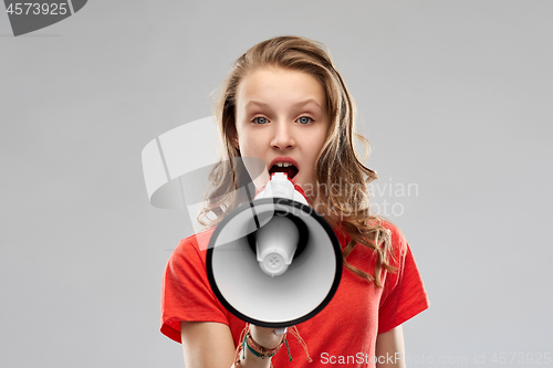 Image of angry teenage girl speaking to megaphone