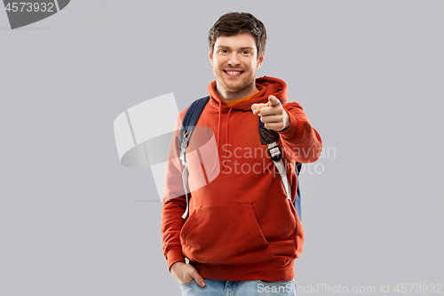 Image of young man or student with school bag or backpack