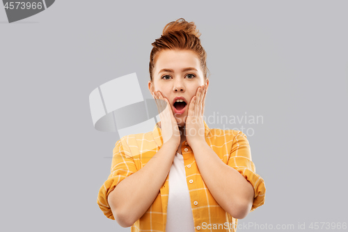Image of shocked teenage girl in with open mouth