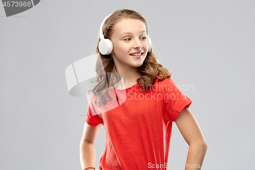 Image of happy teenage girl with headphones