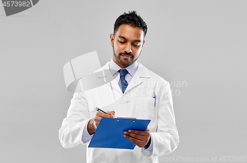 Image of indian male doctor or scientist with clipboard