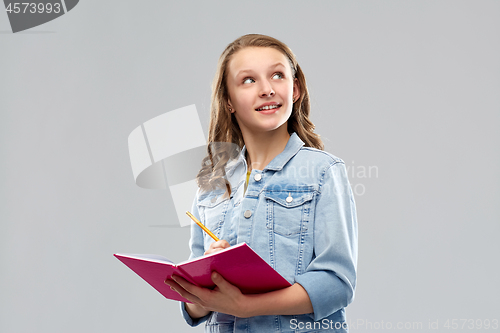 Image of teenage student girl with diary or notebook