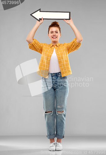 Image of red haired teenage girl with arrow showing to left