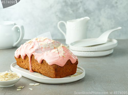 Image of sweet bread covered with melted raspberry chocolate