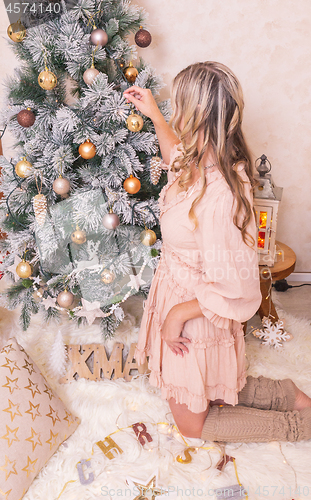 Image of Decorating a Christmas tree