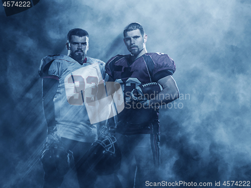 Image of portrait of confident American football players