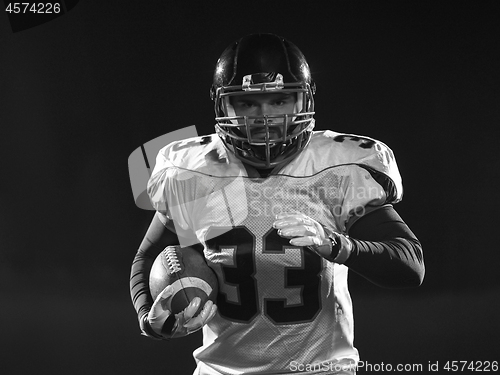 Image of portrait of confident American football player