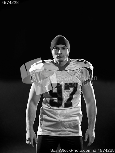 Image of portrait of young confident American football player