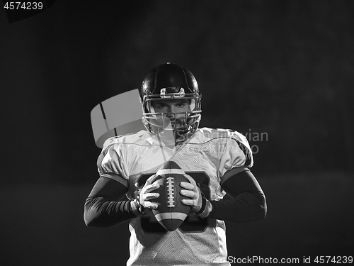 Image of portrait of confident American football player