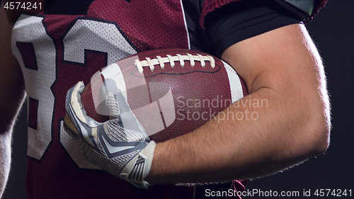 Image of portrait of confident American football players