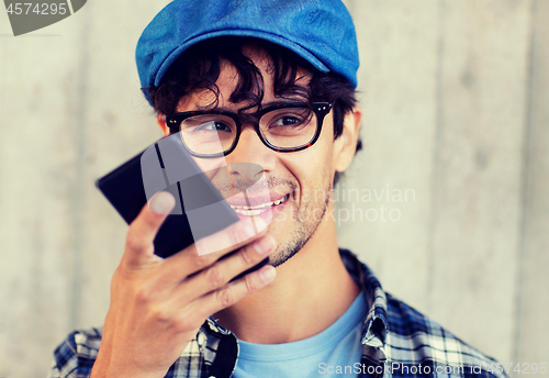 Image of man using voice command or calling on smartphone