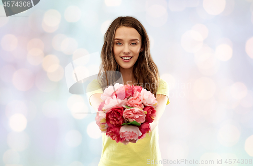 Image of young woman or teenage girl with flower bouquet