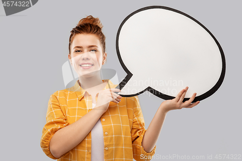 Image of red haired teenage girl holding speech bubble