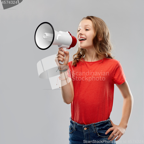 Image of happy teenage girl speaking to megaphone