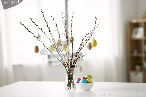 Image of pussy willow branches decorated by easter eggs