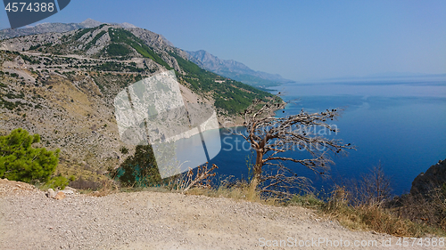 Image of Rocky beach, bue transparent sea