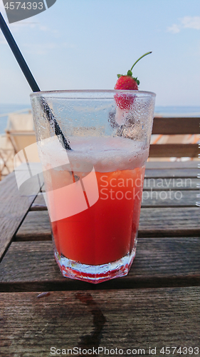 Image of Orange cocktail on the wooden table