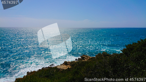 Image of Beautiful azure sea and the rocky beach