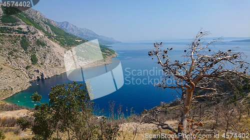 Image of Rocky beach, bue transparent sea