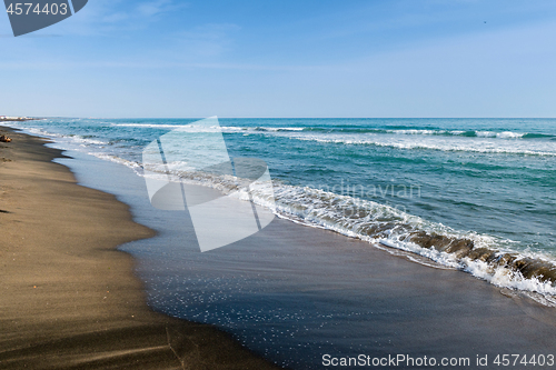 Image of Beautiful sea and the black sandy beach,