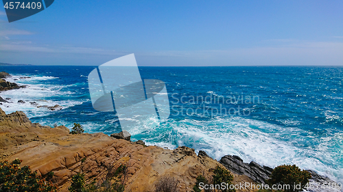 Image of Beautiful azure sea and the rocky beach