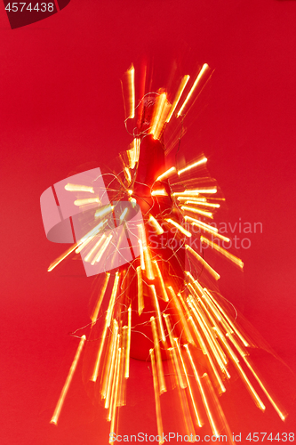 Image of Shined trails of Christmas garland lights as a firework.