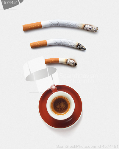 Image of Cigarettes and coffee cup as a wifi icon.