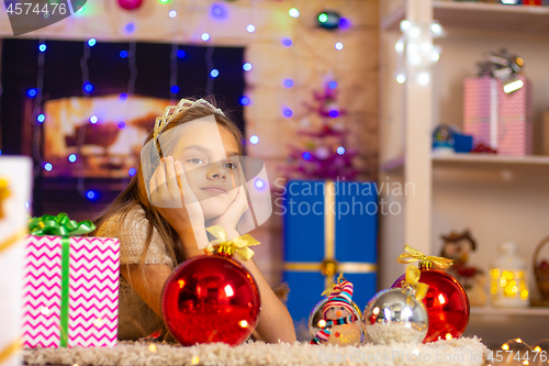 Image of Ten-year-old girl dreams of a New Year gift